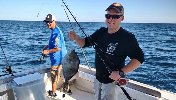 Live action on the Saltshaker Charters fishing trip boat on the ocean near Panama City Beach Florida